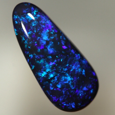 SOLID BLACK OPAL Sparkles of bright blues